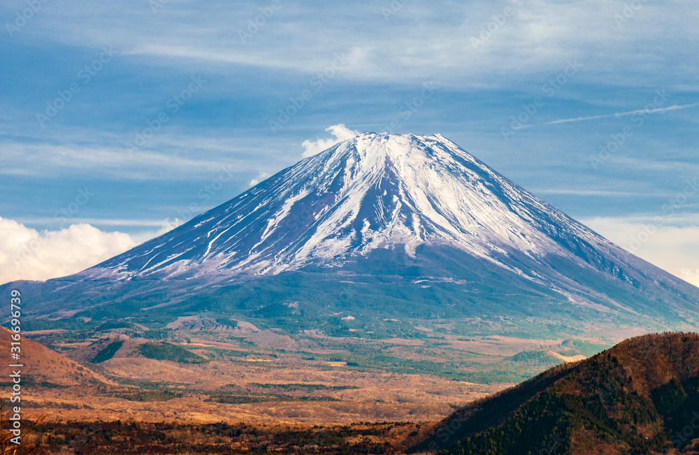Landscape view of mount fuji from lake kawaguchi side with snow cap in winter season. Close up view. Landscape view of mount fuji from lake kawaguchi side with snow cap in winter season. Close up view.