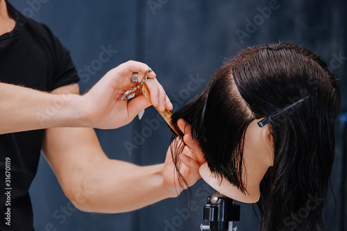 Training hair styling on a mannequin