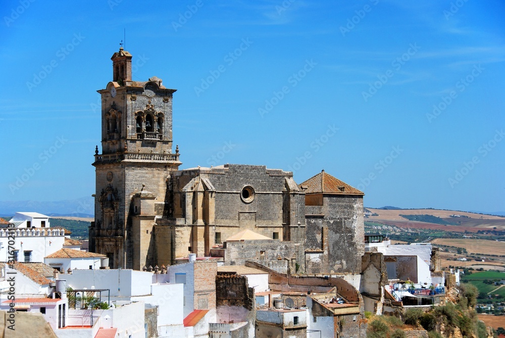 View of St Peters church and town buildings, Arcos de la Frontera, Spain.
