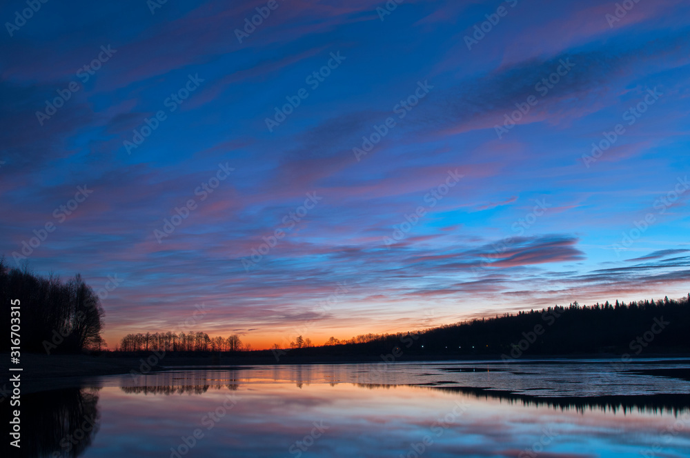 beautiful sunrise on the autumn lake