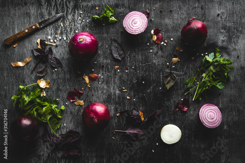 onions on black wood table background