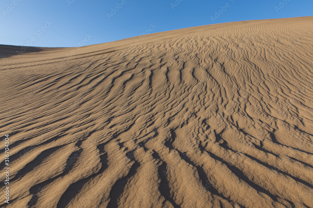 wind patterns in sand desert Bafgh in Yazd, Iran wind patterns in sand desert Bafgh in Yazd, Iran