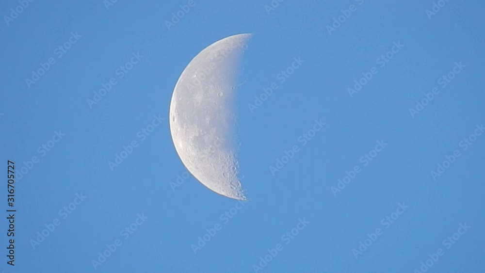 Crescent moon craters on moons surface at daybreak close up. Crescent moon craters on moons surface at daybreak close up.