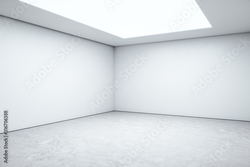 Modern room space with empty white wall