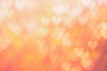 Blurred background of Valentine's day concept. Pink Valentines Day Card. Pastel color tone soft have gradient pattern. Multicolor white pink, orange and red hearts blur wallpaper in love bright sexy..