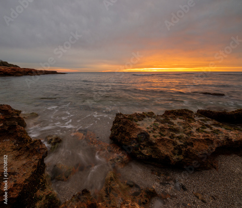 Sunrise on the beach of la renega in Oropesa photo