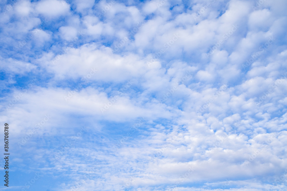 Bright contrasting blue sky with white clouds. Bright contrasting blue sky with white clouds.