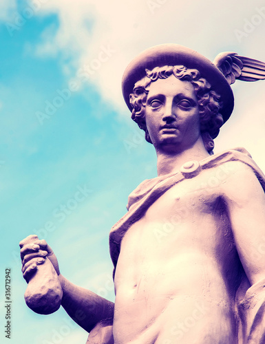 Obraz na płótnie fragment of ancient statue of god Hermes (Mercury) with a purse with gold coins, personification of success, prosperity, patron saint of business, commerce, merchants, entrepreneurs and travelers. w salonie