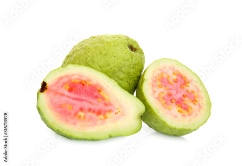 whole and half pink guava fruit isolated on white background