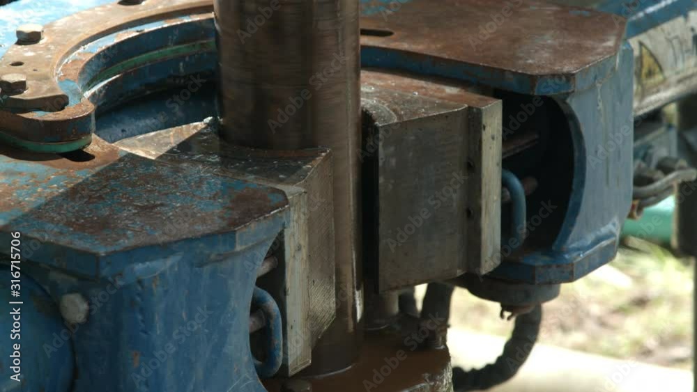 Drill rig drilling groundwater well borehole for residential geothermal heating Drill rig drilling groundwater well borehole for residential geothermal heating