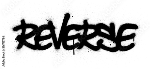 graffiti reverse word sprayed in black over white
