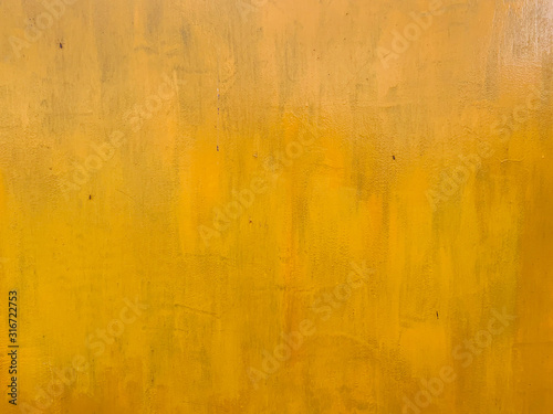 yellow vintage loft wall structure paint as background