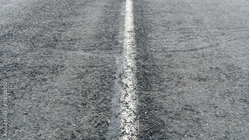 Fototapeta premium asphalt and marking closeup