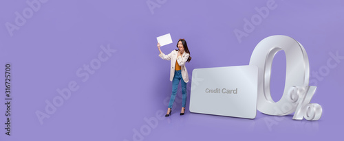 Banner of Asian woman  standing next to credit card with 0% interest installment payment plan