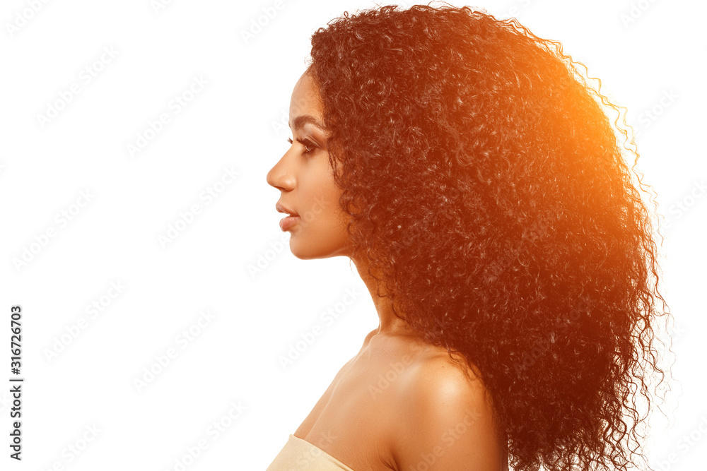 Beauty black skin woman African Ethnic female face. Young african american model with long afro hair. Lux model in profile - obrazy, fototapety, plakaty 
