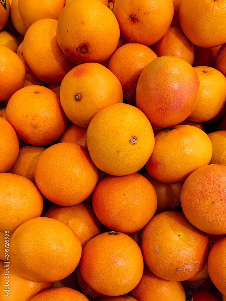 lots of ripe orange fruit to eat as a background