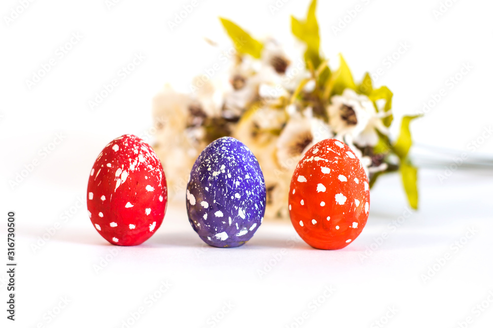 Creative Easter. Easter colored eggs on a white background. Creative Easter. Easter colored eggs on a white background.