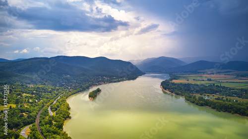 Obraz na płótnie Summer rain and stormy weather. Danube river valley panorama. w salonie