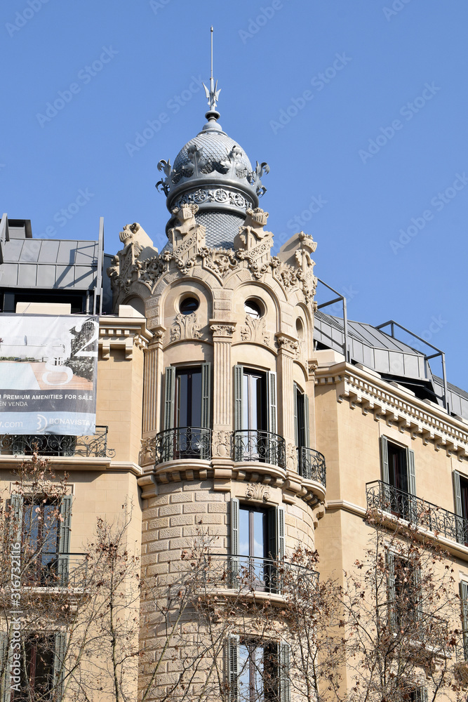 Ornate Spanish Apartment Building with round Tower-Cupola & Balconies