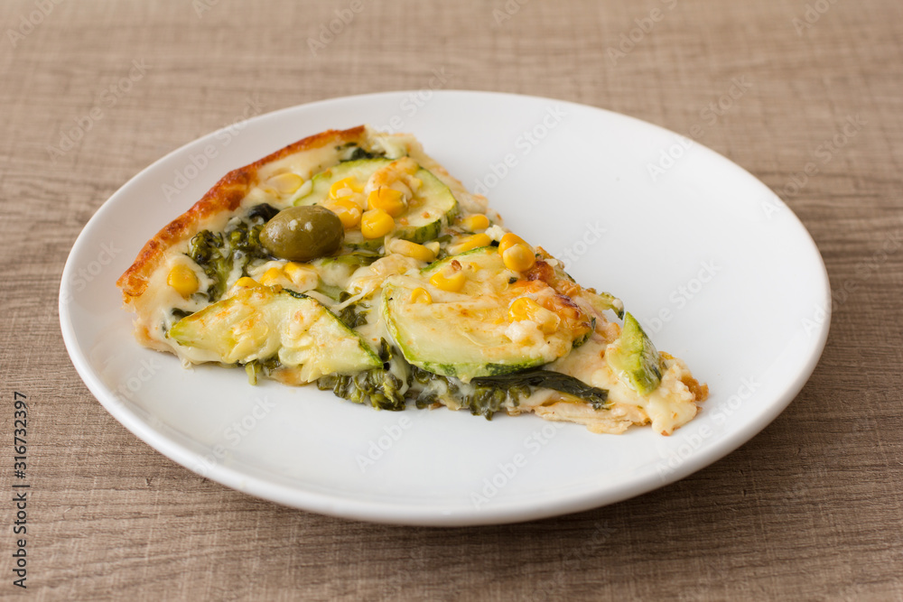 Food plate of pizza. Dish showing italian typical recipe. On rustic wooden table.