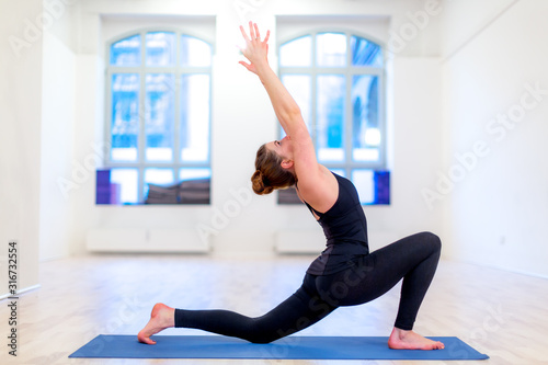 Asana yoga position  warrior pose  right leg forward  left straight