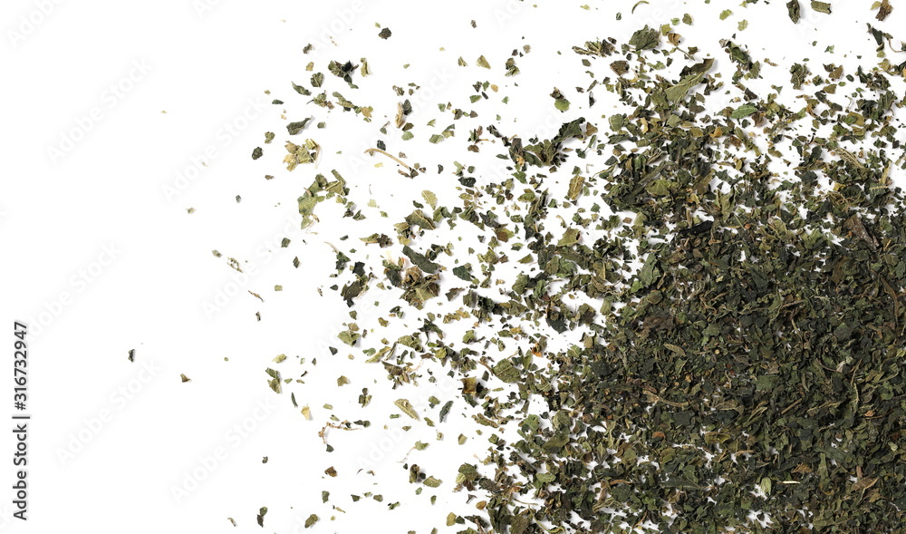 Cut, chopped dry nettle pile, isolated on white background, top view
