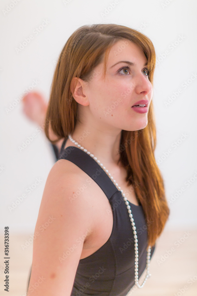 Close up of a young attractive woman doing stretching exercises Close up of a young attractive woman doing stretching exercises