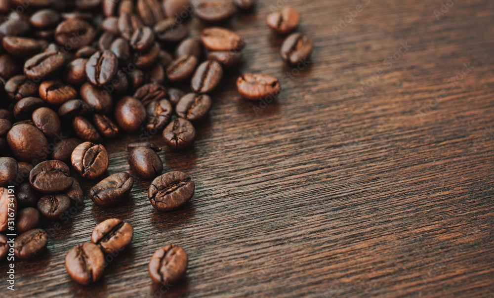Coffee beans on wood background. Coffee beans on wood background.