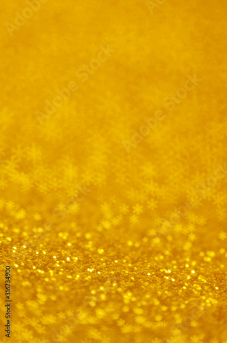 Christmas glowing golden background.