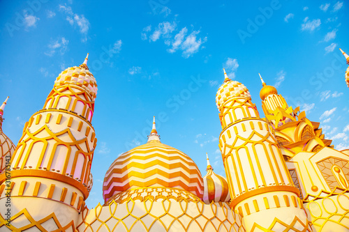 Sunset view of arabic mosque and blue sky