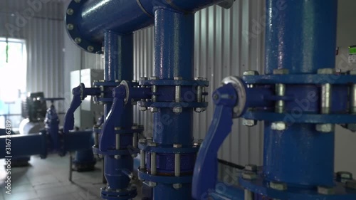 Water valves pipes system condensate equipment at the station of water supply and treatment smooth camera movement