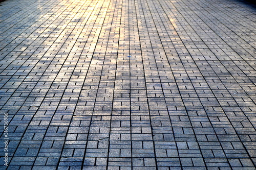 Paving slabs reflect sunlight
