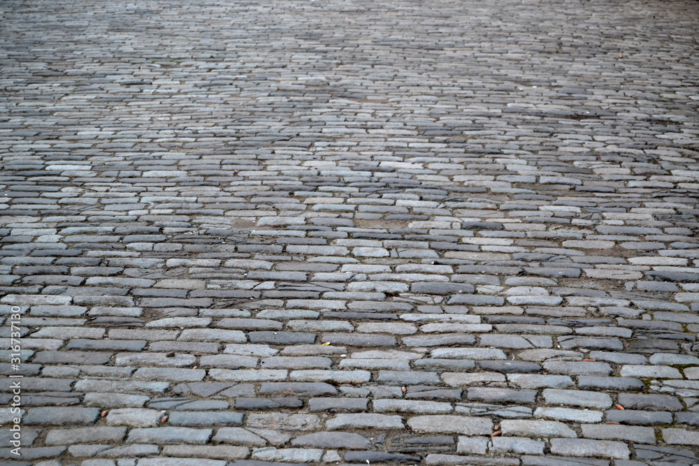 Obraz premium Old granite stone road