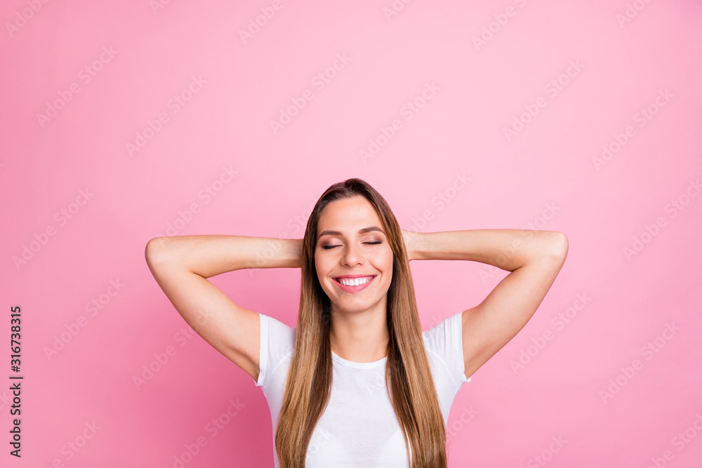 Photo of beautiful lady peaceful harmonic mood holding arms behind head eyes closed toothy dreamy smiling wear casual white t-shirt isolated pink color background Photo of beautiful lady peaceful harmonic mood holding arms behind head eyes closed toothy dreamy smiling wear casual white t-shirt isolated pink color background
