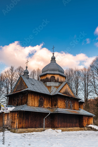 Fototapeta Naklejka Na Ścianę i Meble -  St. Nicholas Orthodox Church in Chmiel. Carpathian Mountains and Bieszczady Architecture in Winter