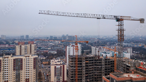 Residential neighborhoods and a new building. Construction of a residential complex. © kalyanby