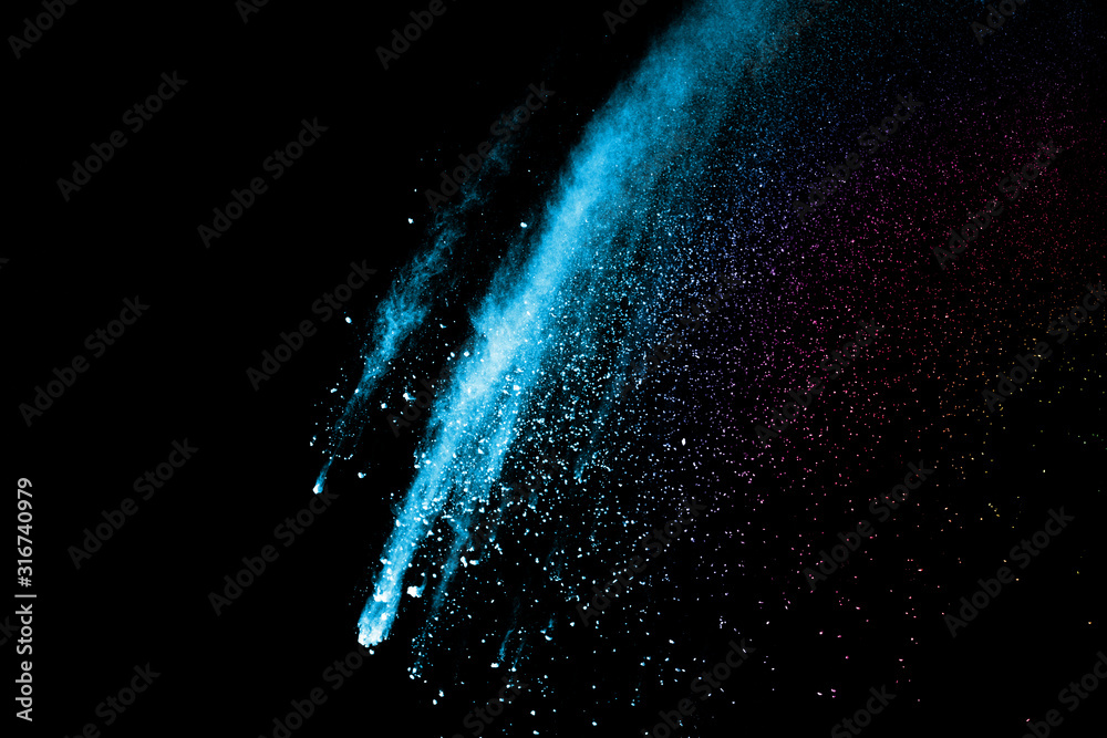 Explosion of colored powder isolated on black background. Abstract colored background. holi festival.