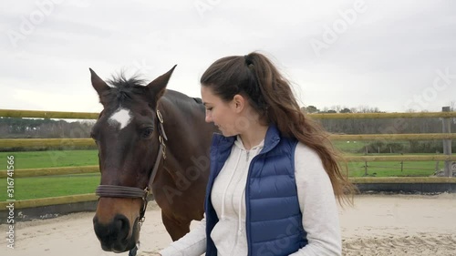 Portrait of horsewoman and horse