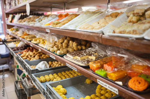 Variety of Indian sweets displayed at store