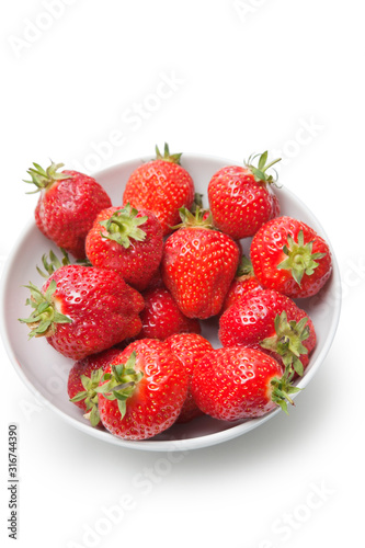 Fototapeta Naklejka Na Ścianę i Meble -  Bowl full of strawberries against white background