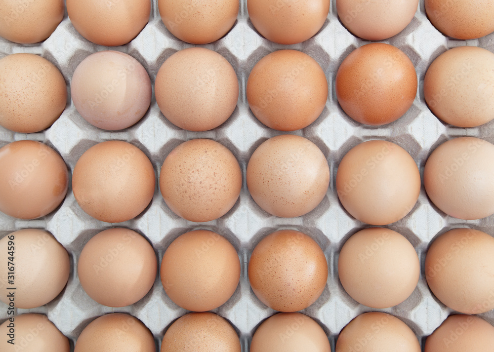 Full-Frame shot of brown eggs arranged in carton Full-Frame shot of brown eggs arranged in carton