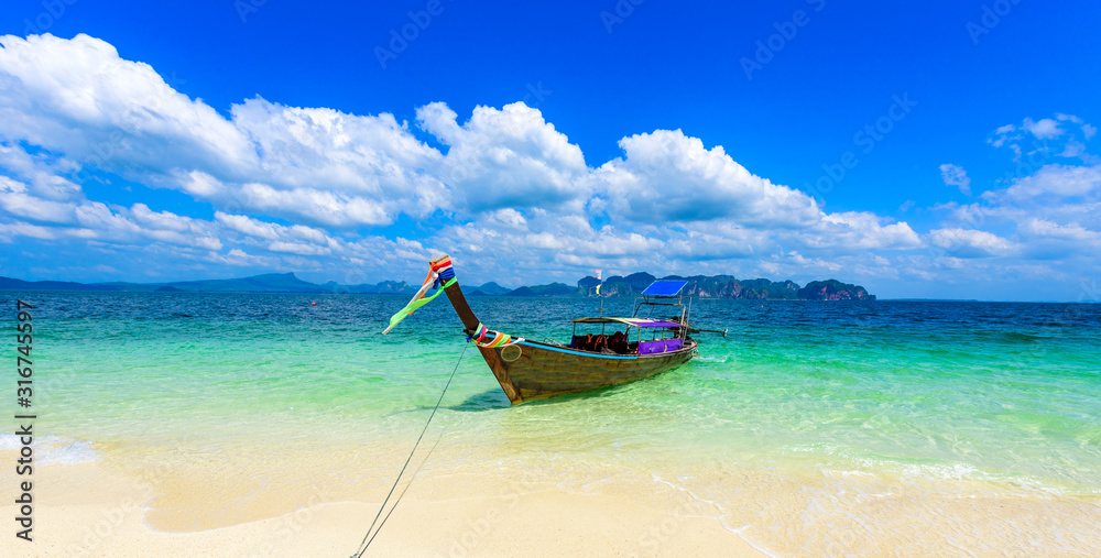 Poda Island - Paradise beach in tropical scenery - near Ao Nang, Ao Phra Nang bay, Krabi, Thailand. Poda Island - Paradise beach in tropical scenery - near Ao Nang, Ao Phra Nang bay, Krabi, Thailand.