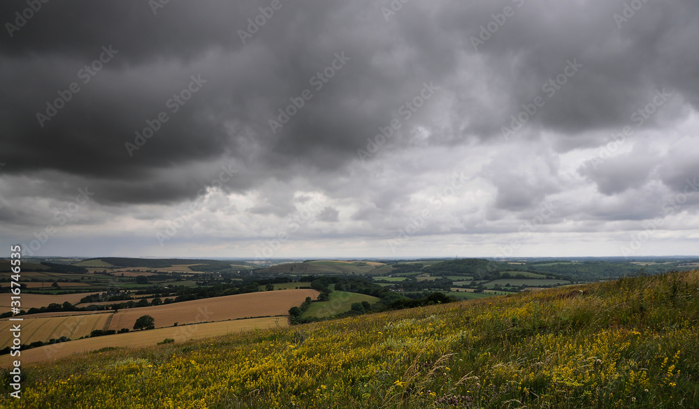 storm over countryside landscape