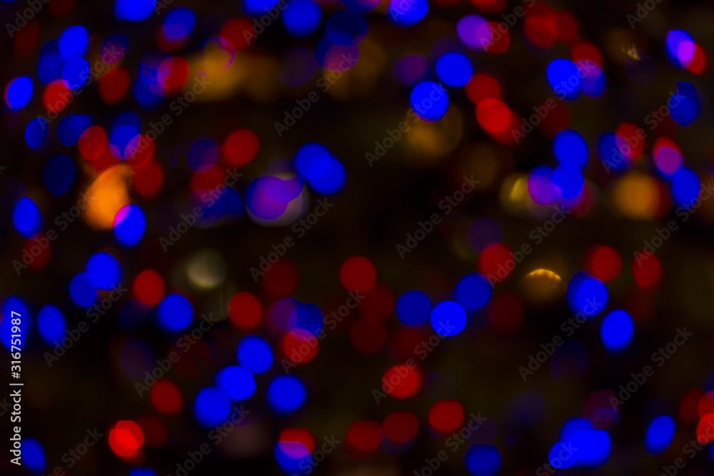 Bokeh and flare of blured background in nightclub. Fresh healthy blue red background with abstract blurred foliage and bright summer sunlight and a central copyspace for your text or advertismen Bokeh and flare of blured background in nightclub. Fresh healthy blue red background with abstract blurred foliage and bright summer sunlight and a central copyspace for your text or advertismen