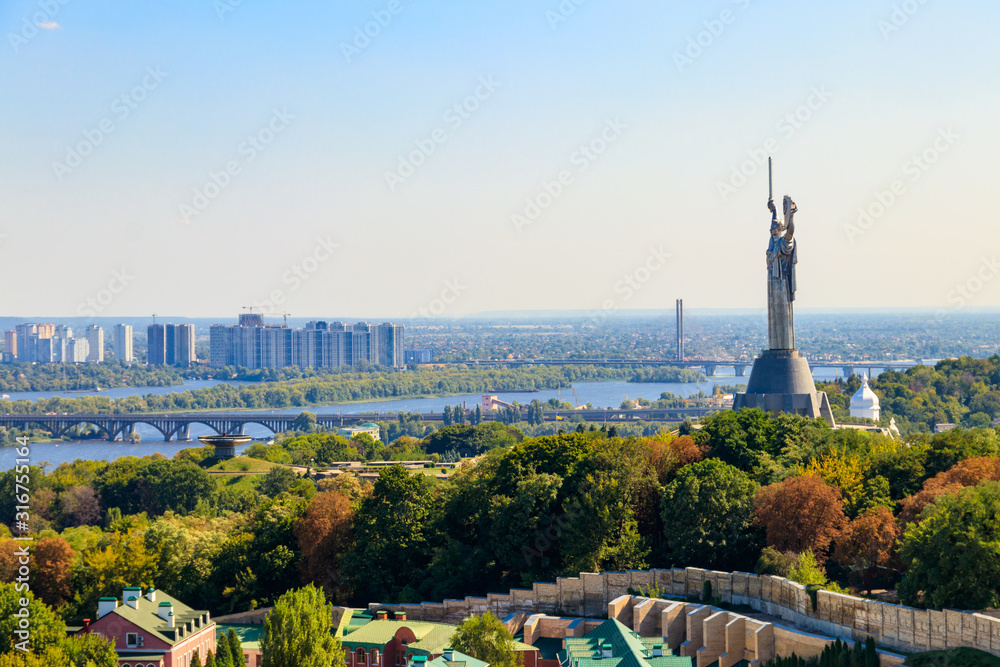 View of Motherland Monument and the Dnieper river in Kiev, Ukraine. Kiev cityscape View of Motherland Monument and the Dnieper river in Kiev, Ukraine. Kiev cityscape