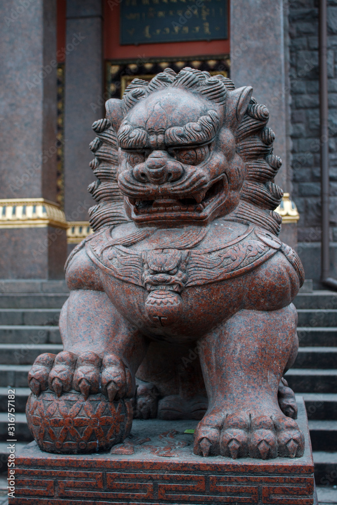 religious sculptures of Buddhist deities in the form of tigers