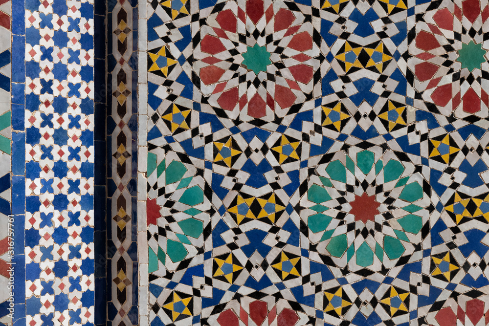 Traditional abstract Moroccan tile mosaic background, royal palace in Fes, Morocco.