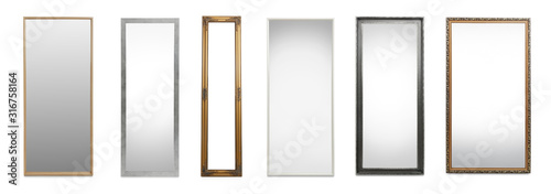 Set of different stylish mirrors on white background photo