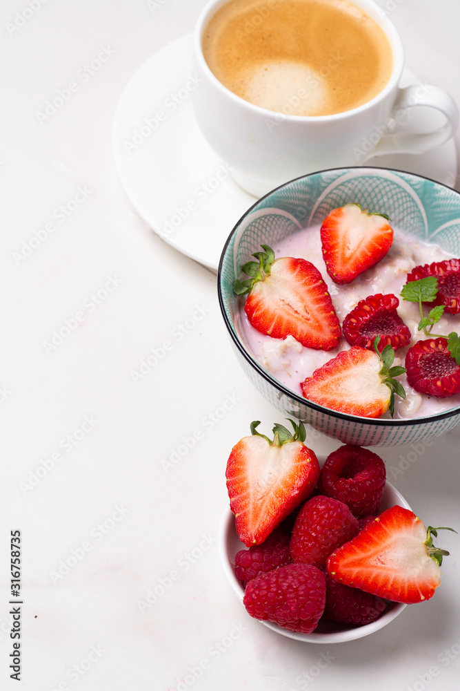 coffee, porridge and berries and place for text coffee, porridge and berries and place for text