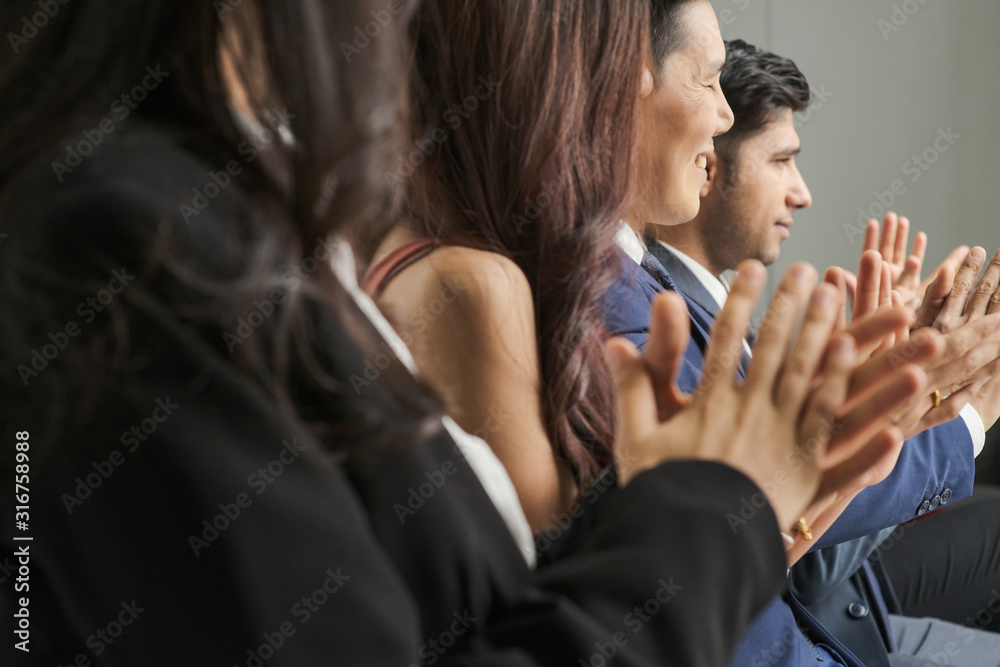 Fototapeta premium Businessmen and businesswomen working team success job creative clapping hand with smiling